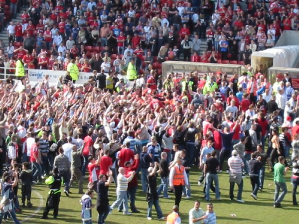 The fans sing in celebration of promotion to League One.